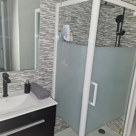 Bedroom With Breakfast Dining Area And Shower